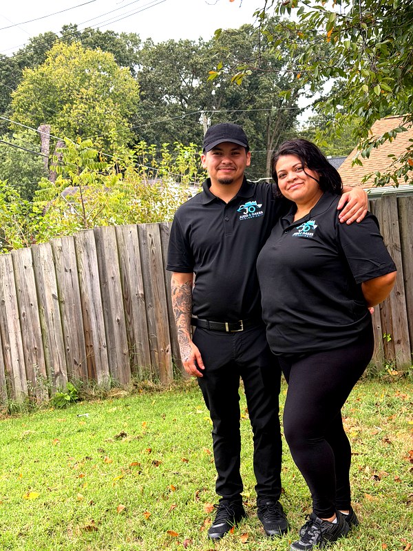 Oscar and Judy Sanchez, owners of Judd & Oakes Cleaning, in branded uniforms